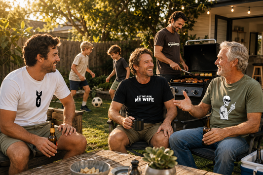 Funny Father's Day gift ideas for Australian dads wearing Walking Canvas graphic tees at a backyard barbecue